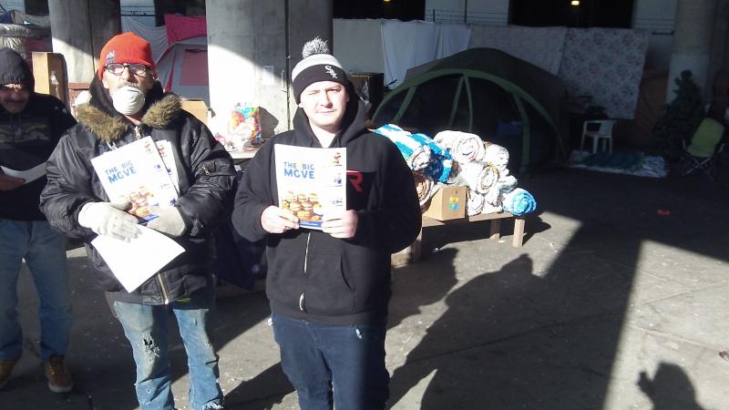 GCA Service homeless men under a viaduct in Chicago IL