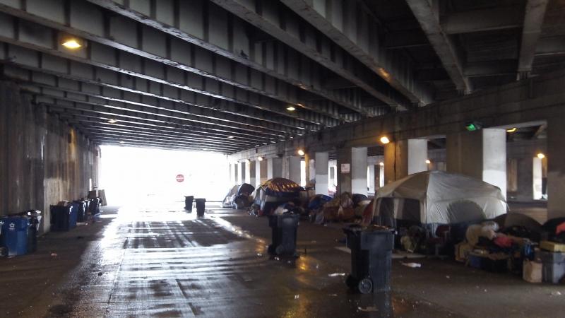 Homeless encampment under viaduct 90-94 Fullerton. GCA services this encampment
